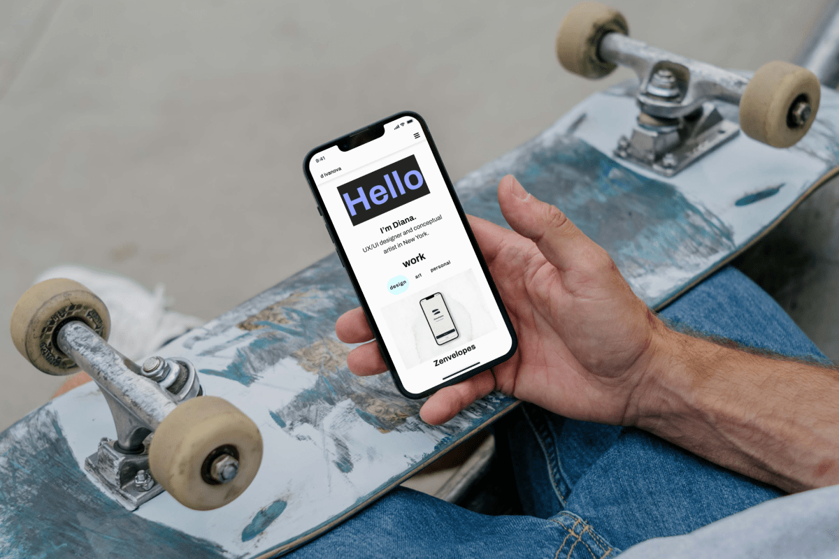 skateboarder holding a mobile device showing the home page